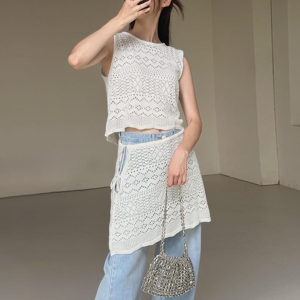 Dali setup punching wave knit mini skirt