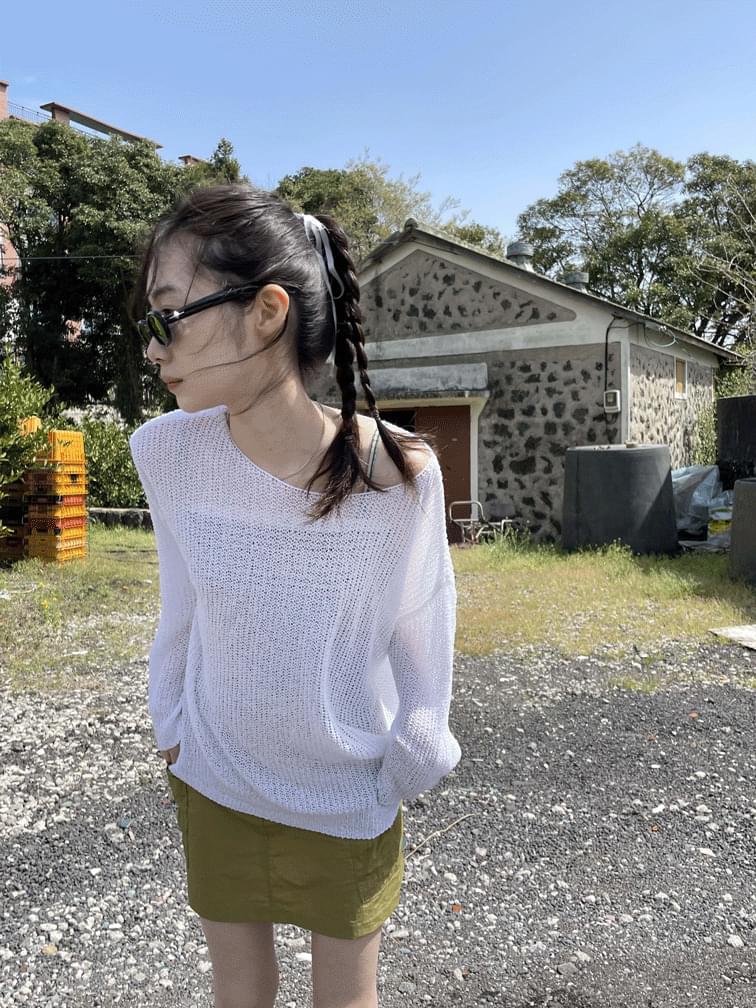 by boat-neck knit