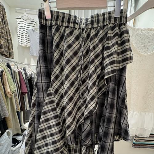 Unbalanced check skirt